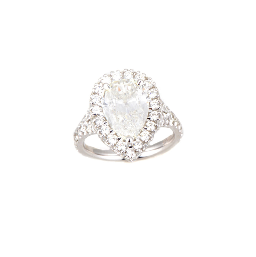 18K Pear Shape Diamond Ring with Two Side Diamond Halo and Gallery on Split Shank.